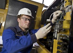 1654665744094 Cat Technician Draws Oil Sample 1654665744094 Cat Technician Draws Oil Sample