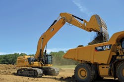 Caterpillar-395-excavator-loads-Truck