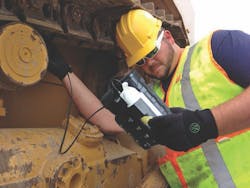 1654797132424 Modustri Man Inspecting 1654797132424 Modustri Man Inspecting