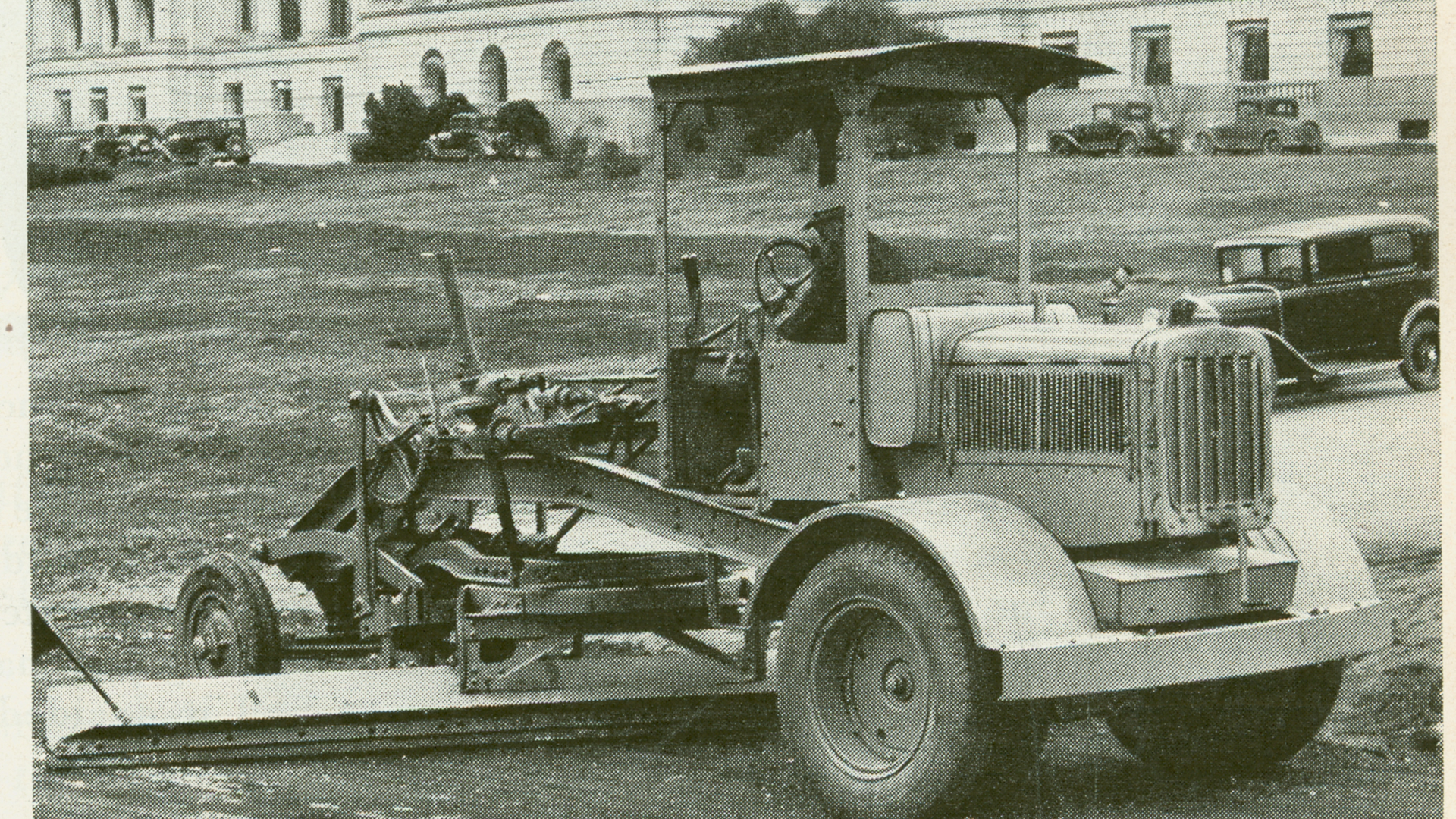 As the world&rsquo;s first integral motor grader, the Auto Patrol was marketed heavily to states for road maintenance. This image from a 1932 Caterpillar advertisement shows one at work behind the Arkansas State Capitol. (Roads & Streets magazine, January 1932)