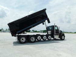 (Inset) A typical Class 8 truck has 35 to 45 microchips, and they are at the top of the list of shortages hobbling automotive manufacturing, observers say.In early June, this 122SD dumper (left) was the only new truck available for sale on Fyda Freightliner&rsquo;s lot near Columbus, Ohio. It sold fast, the dealer says. The normal wait for a new construction truck can be two years.