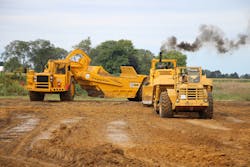 Earthmoving 1960s style as Cat D9G sets to work pushing an Allis-Chalmers 260 while one of the Cat 631Bs swings into the cut. All are owned by the Museum.