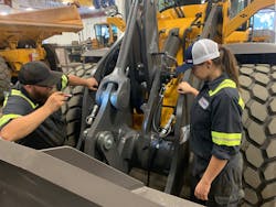 J-Tech Institute graduates and Alta Equipment Company technicians TJ Wright and Tiffany Roberts examine a wheel loader at Alta’s Jacksonville location. J-Tech Institute graduates and Alta Equipment Company technicians TJ Wright and Tiffany Roberts examine a wheel loader at Alta’s Jacksonville location.