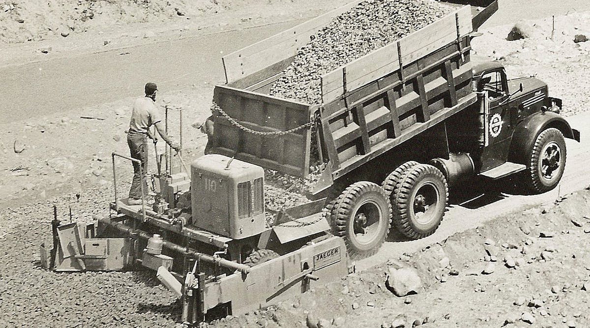 A Jaeger SPS-W series base paver lays material on part of the Pennsylvania Turnpike. The &ldquo;W&rdquo; indicates wheel mounting instead of crawlers.