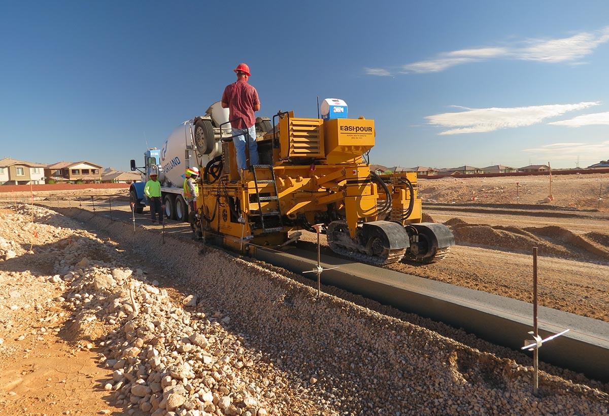 Curb and gutter pavers have come a long way. Depending on the unit, they can pave using stringlines or with stringless, 3D operation.