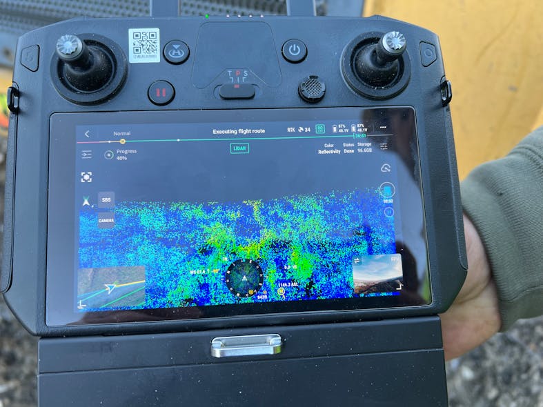 The LiDAR display live on the remote control as Rutledge Excavating&apos;s drone maps a site. A six-minute flight takes 110 still photos and thousands of data points.