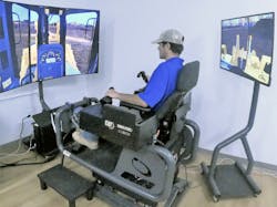A TCAT Knoxville student learns how to operate a dozer on the Cat Simulators dozer system. A TCAT Knoxville student learns how to operate a dozer on the Cat Simulators dozer system.
