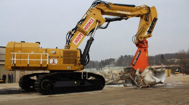 Cat 6015 excavator has a Fortress 145FS Series Mobile Shear and a custom-designed and built Pierce Pacific 3-piece boom/stick.