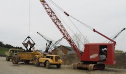 A fully restored Manitowoc 125 Speedcrane hard at work during the 2022 Open House of Lakeside Sand & Gravel. It’s loading a bottom dump wagon drawn by a Cat DW10. The Open House is held the last Saturday of each April at the Lakeside plant in Mantua, off the Ohio Turnpike between Exits 187 and 193 east of Cleveland. It features machines from Lakeside’s extensive collection, admission is free, and all proceeds from lunches served go to the Hattie Larlham Foundation, a local charity serving the developmentally disabled. A fully restored Manitowoc 125 Speedcrane hard at work during the 2022 Open House of Lakeside Sand & Gravel. It’s loading a bottom dump wagon drawn by a Cat DW10. The Open House is held the last Saturday of each April at the Lakeside plant in Mantua, off the Ohio Turnpike between Exits 187 and 193 east of Cleveland. It features machines from Lakeside’s extensive collection, admission is free, and all proceeds from lunches served go to the Hattie Larlham Foundation, a local charity serving the developmentally disabled.