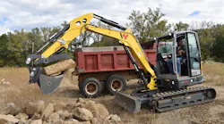 The Geith thumb and quick coupler make quick work of a stone slab. The hydraulic quick coupler is factory installed as standard equipment on the ET58.
