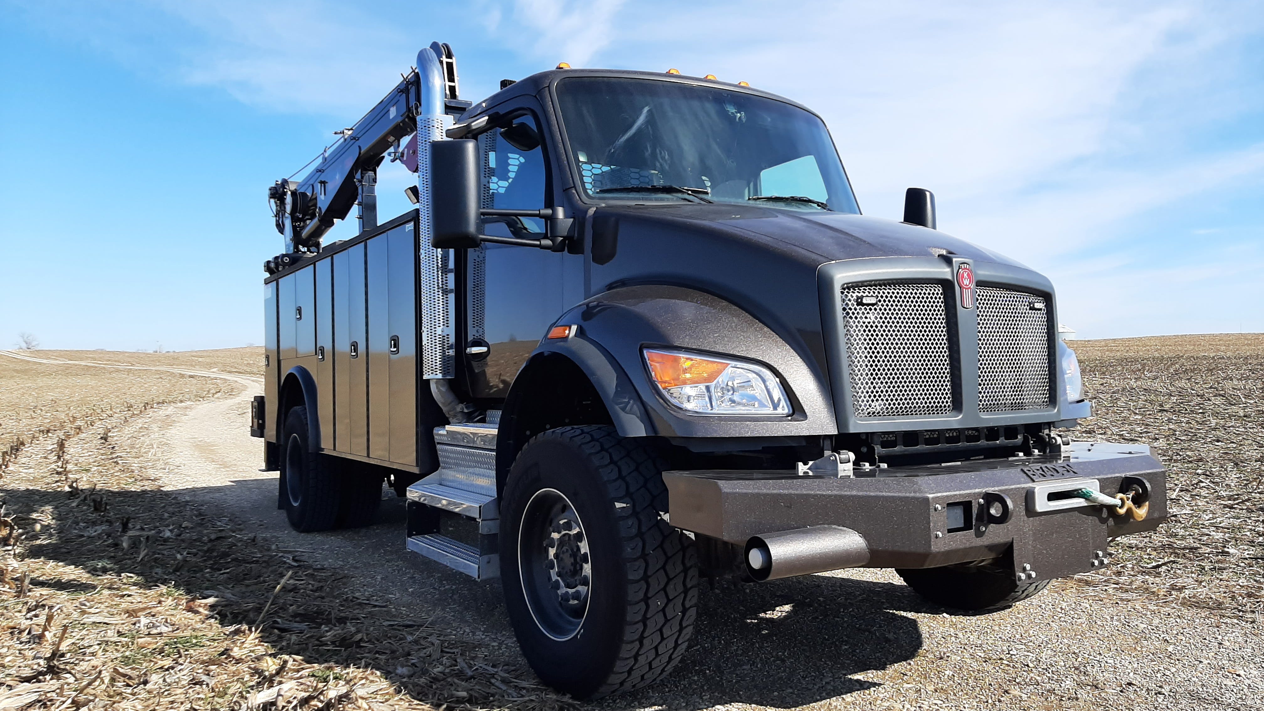 The T380&rsquo;s 4x4 system operated smoothly but of course wasn&rsquo;t challenged by this dry dirt trail that ran alongside corn fields. Special equipment includes Braden steel &ldquo;recovery&rdquo; bumper that housed a 20,000-pound hydraulic winch, and a 12,000-pound Stellar telescoping crane for lifting heavy machinery components.