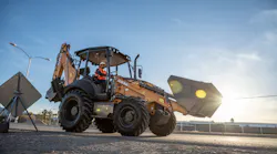The Case Utility Plus backhoe loader.