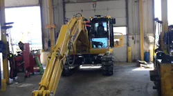 Excavator In Shop