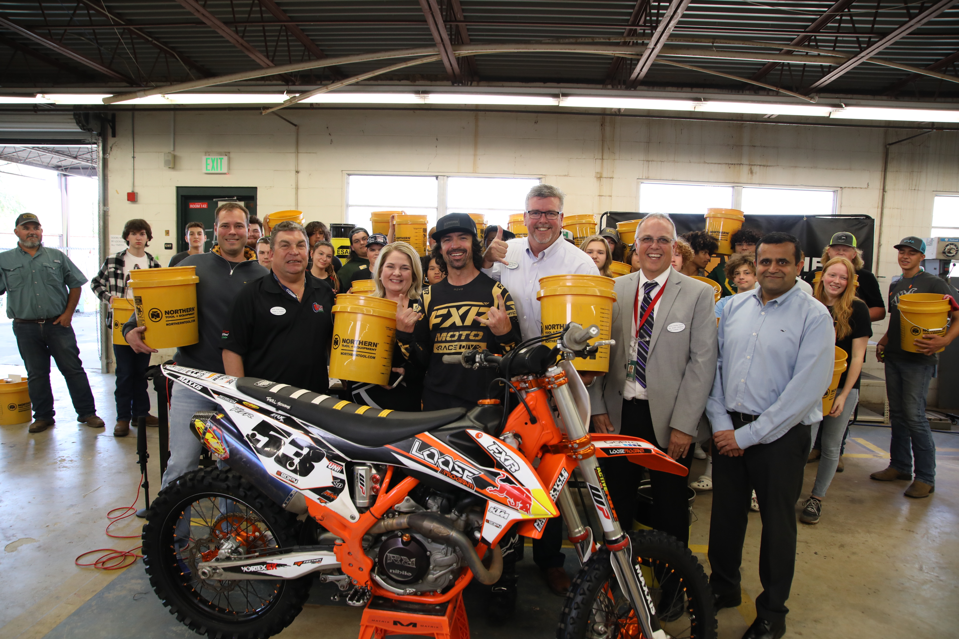 Ronnie Renner (center), 10-time X Games gold medal winner, poses with students from Lecanto High School.