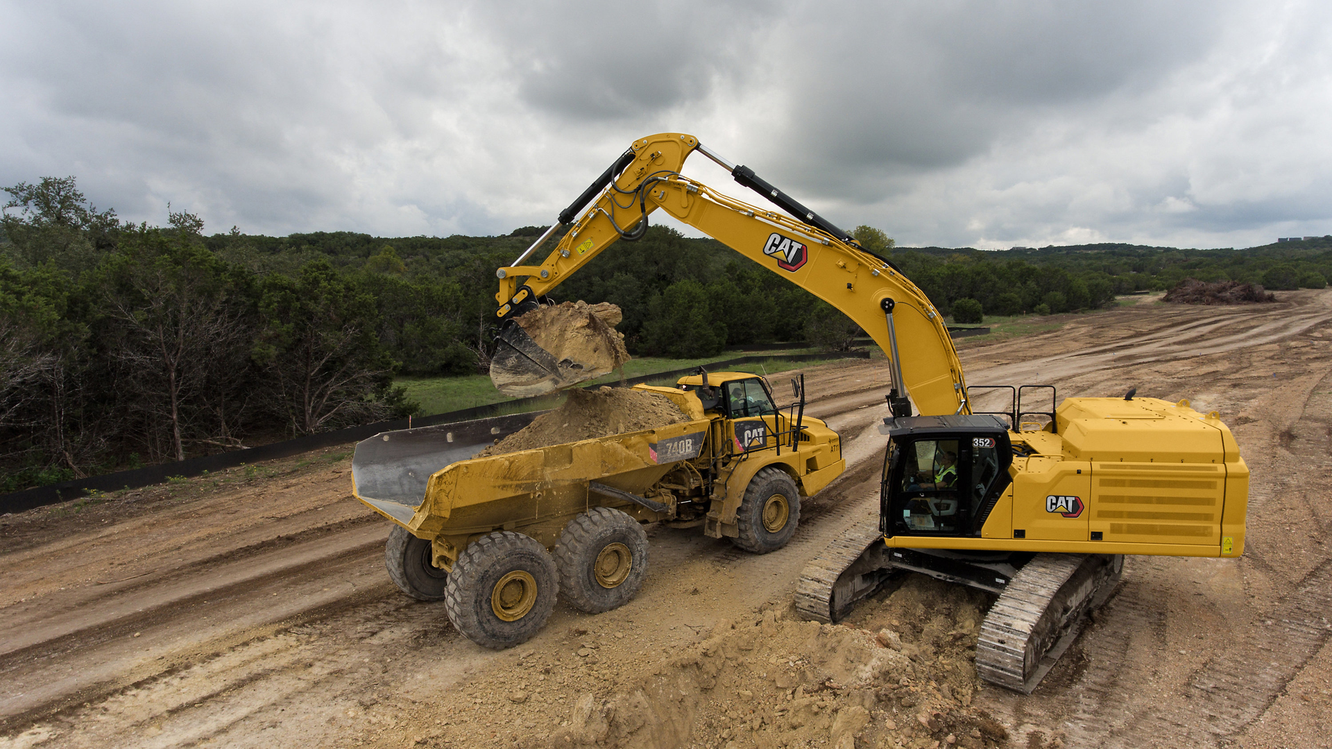 Cat 352 Excavator Loading An Articulated Haul Truck