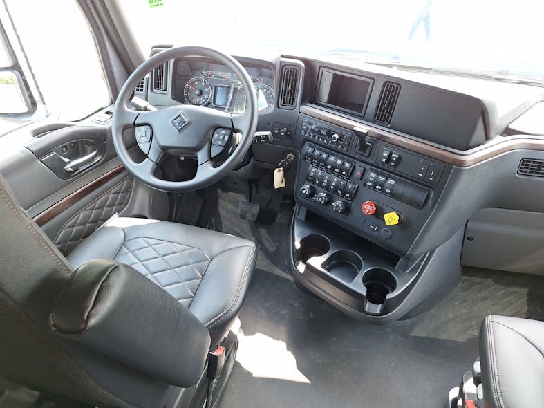 This tractor has Diamond Elite trim with leather seat covers. Instrument panel includes electro-mechanical gauges and info screens. Originally built with an aluminum cab from the old Paystar and 9900i, HX series was given a new lightweight galvanized steel cab in 2020.