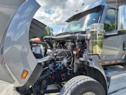The International S13 diesel has a clean, uncluttered look. Most routine service points are on the left side. Six vocational ratings, from 370 to 515 horsepower, are offered. The engine and T14 automated transmission weigh 3,197 pounds. A Cummins X15 with Eaton AMT is optional in an HX520. Both have setback steer axles, while steer ales are set forward in HX530 and 630 models; HX520’s is set forward. The International S13 diesel has a clean, uncluttered look. Most routine service points are on the left side. Six vocational ratings, from 370 to 515 horsepower, are offered. The engine and T14 automated transmission weigh 3,197 pounds. A Cummins X15 with Eaton AMT is optional in an HX520. Both have setback steer axles, while steer ales are set forward in HX530 and 630 models; HX520’s is set forward.
