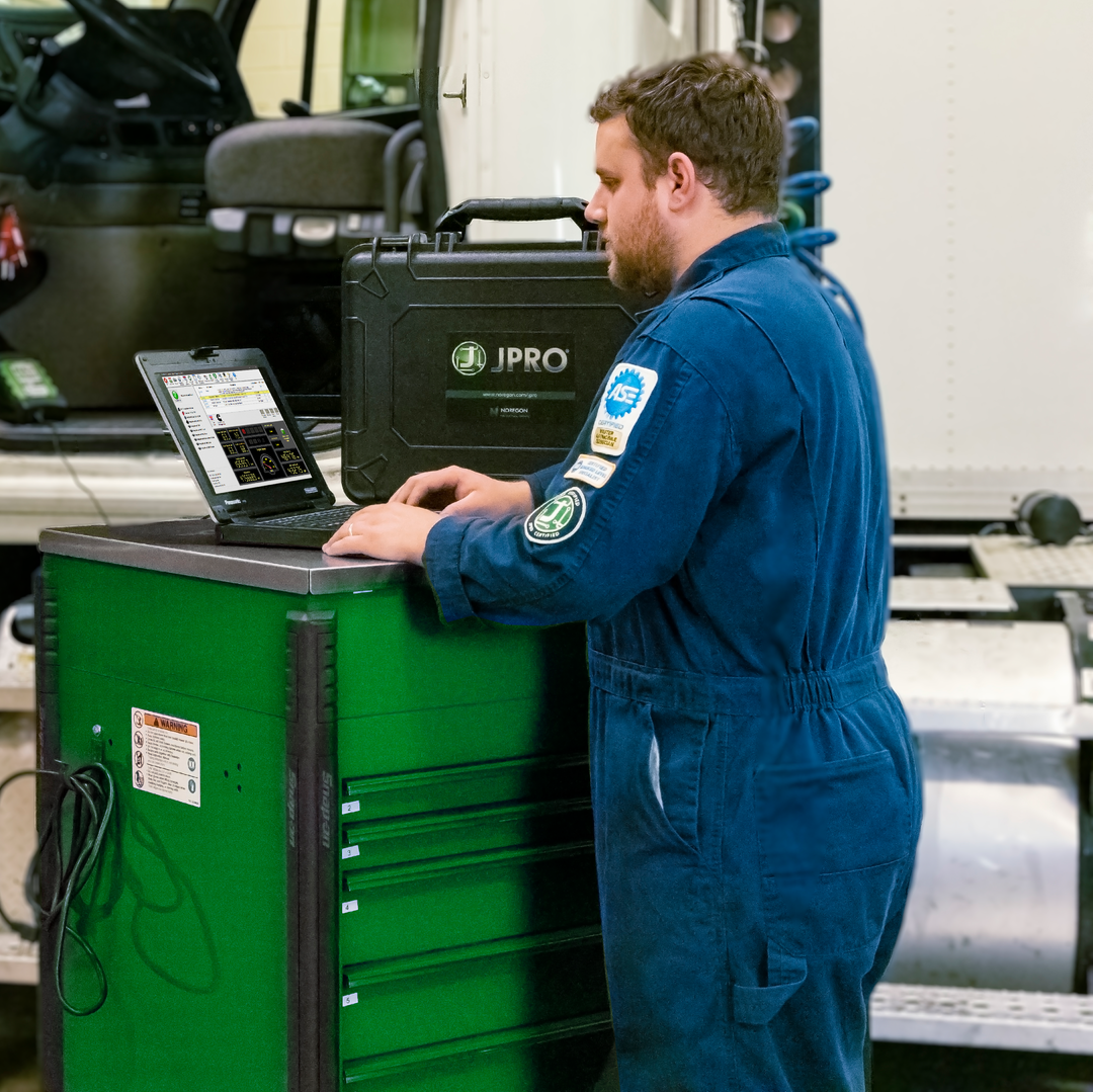 Technician works on a truck
