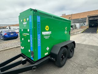 An energy storage system powered by battery electric technology stands ready to save diesel fuel and lower emissions and noise. It is through trying portable power sources like this one that many fleets may have an introduction to greener operation.