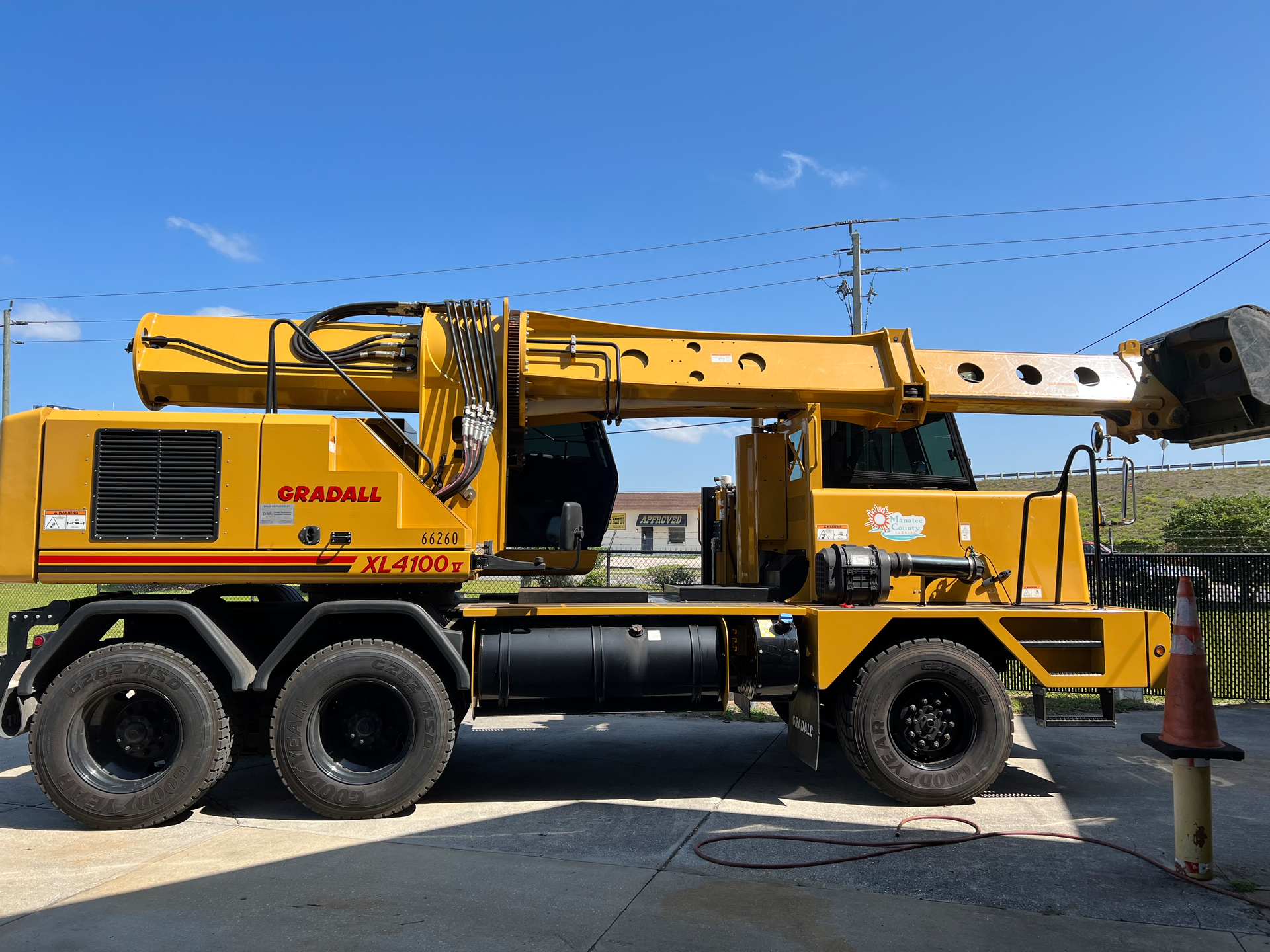 This wheeled excavator runs on diesel, like much of Manatee County's equipment. Before the county goes to electric yellow iron, its fleet manager says he needs to see more options from manufacturers.