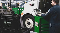 Technician Working On A Truck Technician Working On A Truck