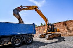Excavator Loads Truck Excavator Loads Truck