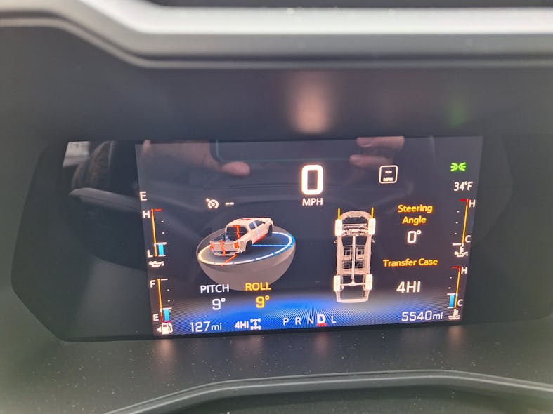 Trail Boss is at its best while off road, and the color screen (inset) shows the truck&rsquo;s position relative to ground and transfer case setting, plus speed and engine condition gauges. Other information can be called up with a button on a steering wheel spoke.