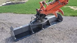 A 'grading beam' attachment for an excavator. A 'grading beam' attachment for an excavator.
