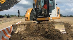 Liebherr excavator with blade. Liebherr excavator with blade.