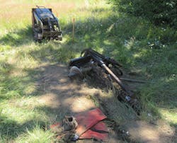 L&amp;I photo shows the walk-behind trencher a 16-year-old boy was using to dig a channel for fence posts.