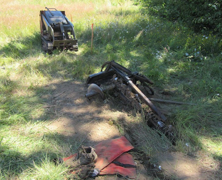 L&amp;I photo shows the walk-behind trencher a 16-year-old boy was using to dig a channel for fence posts.
