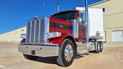 Model 589 daycab tractor in “legendary” red with a black band looks handsome and purposeful, but closely resembles previous models. That is exactly what customers said they wanted and what Peterbilt designers gave them. The main change is the 2.1-meter-wide aluminum cab that’s 8 inches broader than the cabin on the 389, which now is out of production. Like older “Petercars,” the 589 can be outfitted for highway and on/off-road vocational duties. Model 589 daycab tractor in “legendary” red with a black band looks handsome and purposeful, but closely resembles previous models. That is exactly what customers said they wanted and what Peterbilt designers gave them. The main change is the 2.1-meter-wide aluminum cab that’s 8 inches broader than the cabin on the 389, which now is out of production. Like older “Petercars,” the 589 can be outfitted for highway and on/off-road vocational duties.