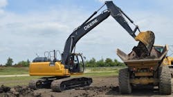 An excavator similar to this was demolishing a building in Michigan.