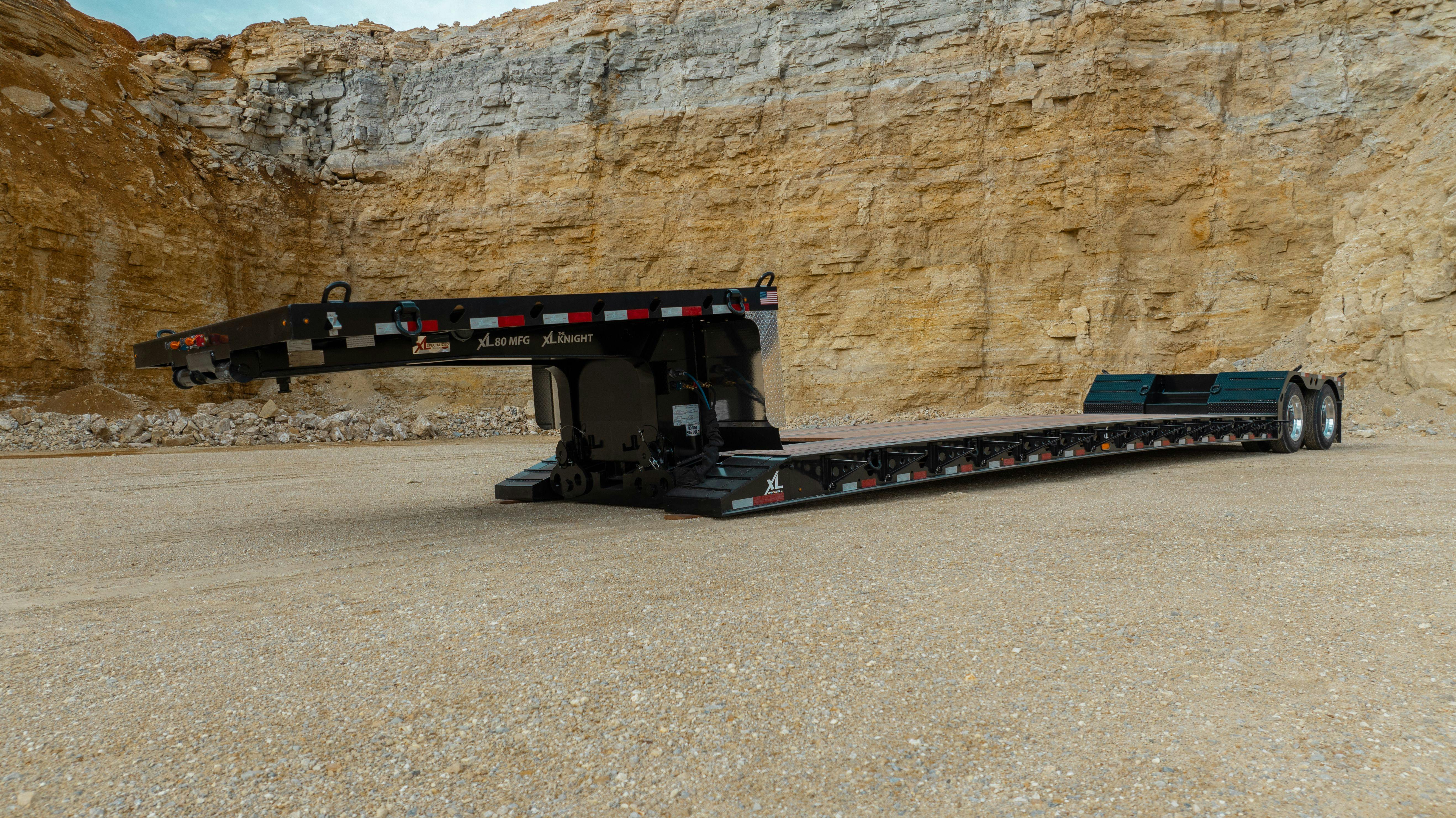 Detachable gooseneck trailer can carry up to 80,000 pounds.