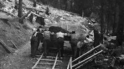 Pushing a load of earth uphill. Pushing a load of earth uphill.