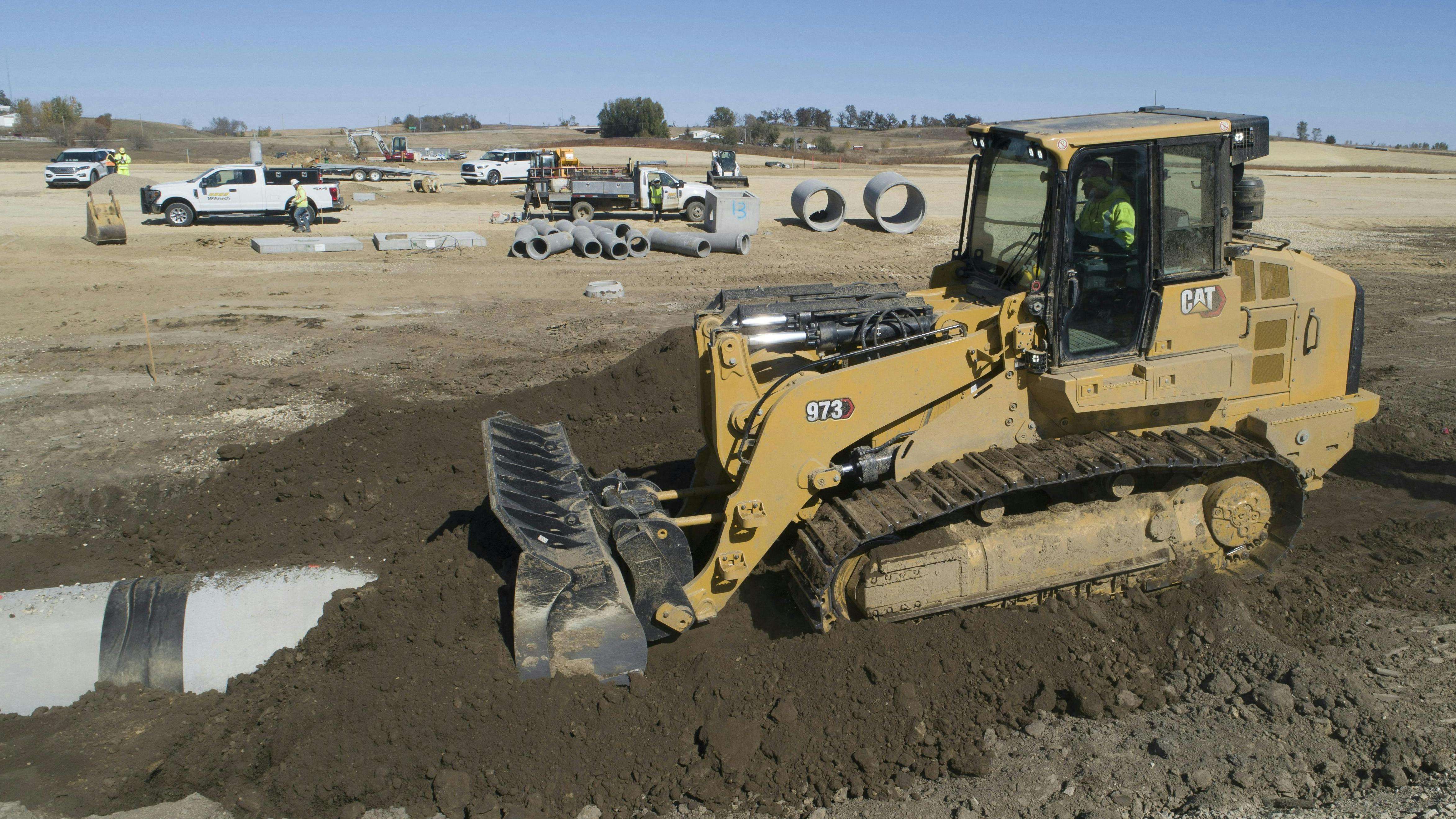 Cat 973 has an operating weight of 66,000 pounds.
