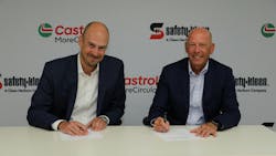 Andreas Osbar, CEO of Castrol Americas (left) and Brian Weber, President of Safety-Kleen Sustainability Solutions, a segment of Clean Harbors, Inc., sign the partnership agreement.