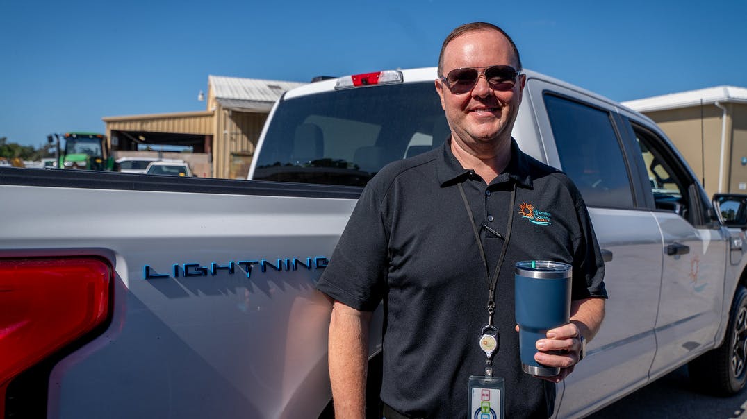 Matt Case, CEM, with an F-150 Lightning EV.