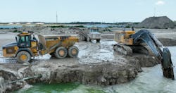Tomahawk’s Teleo enabled articulated dump trucks ready to be loaded by an excavator in Naples, Florida. Tomahawk’s Teleo enabled articulated dump trucks ready to be loaded by an excavator in Naples, Florida.