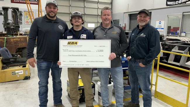 Left to right: Jared Hayes, general manager of Troy's Tech Repair in Mt. Vernon, Illinois, joined David Gordon and SIC Diesel Technology instructor Chris Jones in presenting Caleb Tripp with his scholarship.