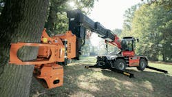 The Woodcracker grapple operating on a Manitou rotating telehandler.