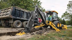 Deere L Series backhoe loader. Deere L Series backhoe loader.