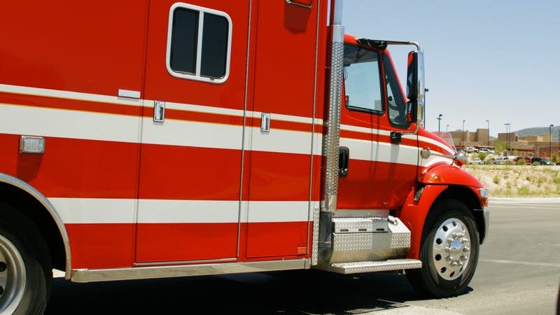 An on-site amputation freed a worker's leg from a paver auger.