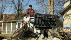 Rake grapple in use on site. Rake grapple in use on site.