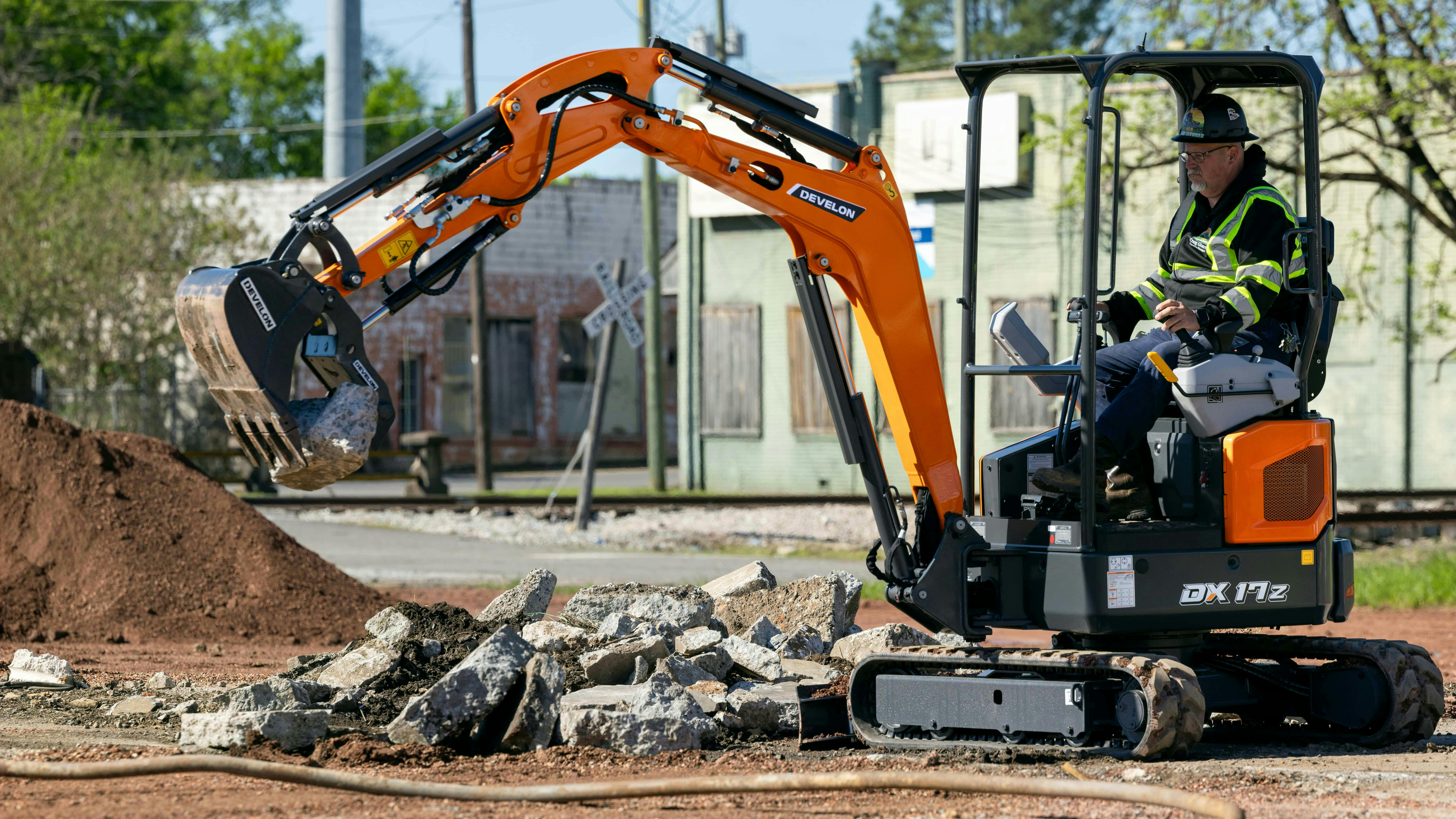 The DX17X-7 digs to 7 feet 3 inches.