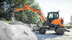 Develon DX100W-7 excavator digs to 13 feet 11 inches. Develon DX100W-7 excavator digs to 13 feet 11 inches.