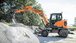 Develon DX100W-7 excavator digs to 13 feet 11 inches. Develon DX100W-7 excavator digs to 13 feet 11 inches.