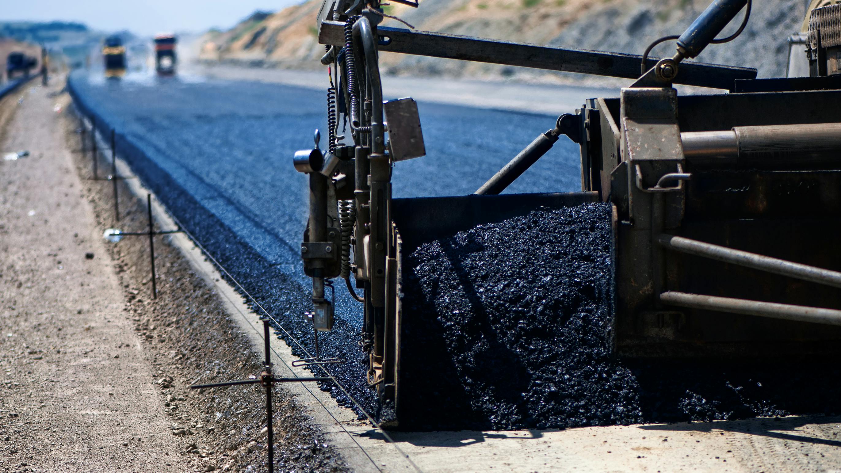 Paver laying asphalt