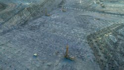 Aerial view of the three autonomous drills at the Mt. Arthur South mine. Aerial view of the three autonomous drills at the Mt. Arthur South mine.