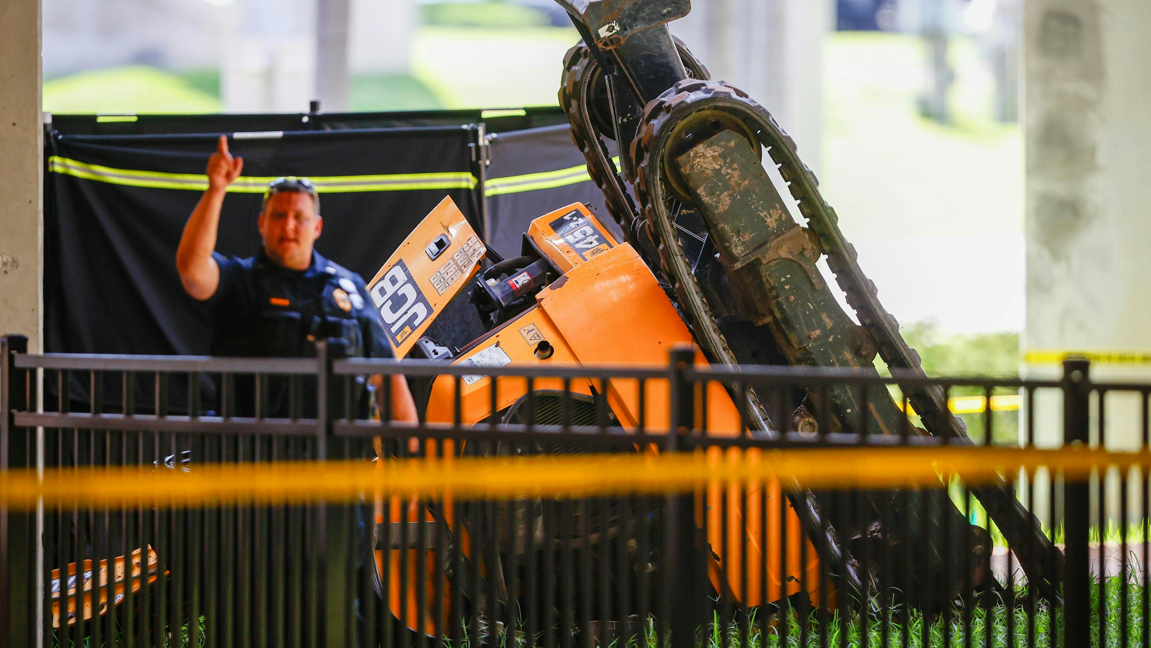 A JCB excavator fell off a shuttle track at Tampa International Airport.